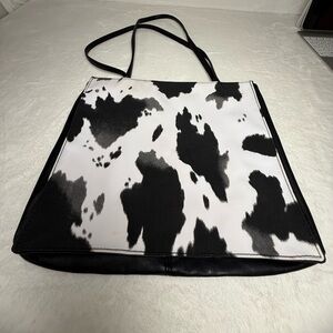 Cowprint Black and White Tote Bag with a Red Interior
